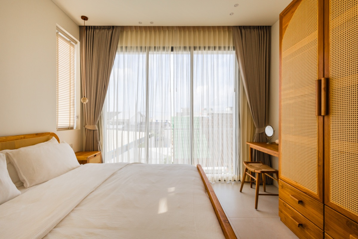 Bedroom with rattan wardrobe